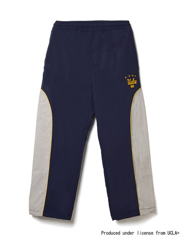 
                  
                    UCLA フットボール ナイロントラックパンツ
                  
                