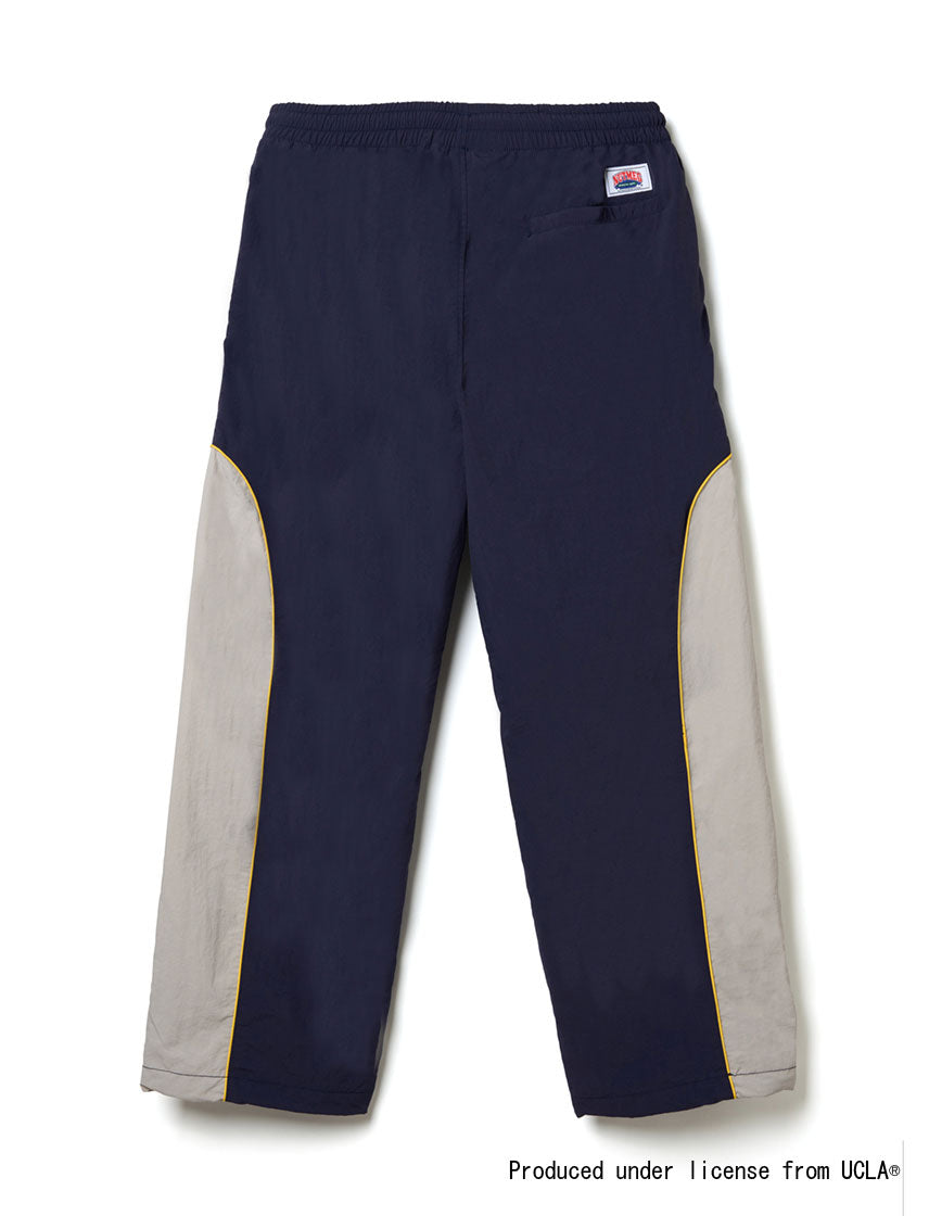 UCLA フットボール ナイロン切り替えトラックパンツ｜NUTMEG(ナツメグ