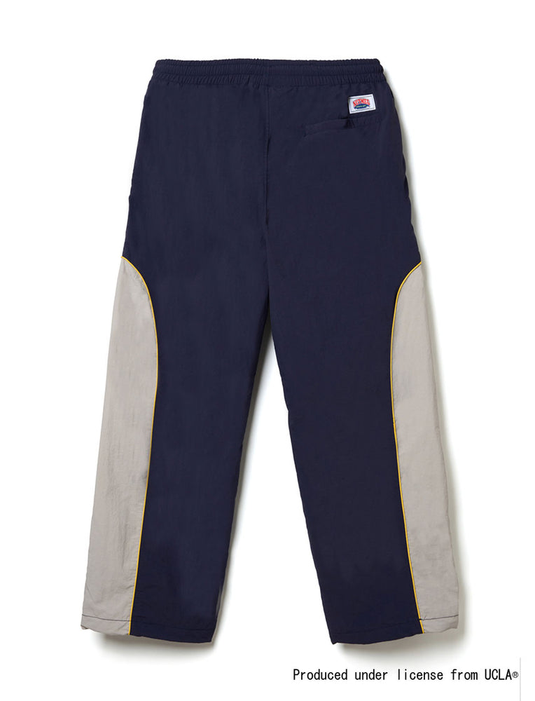 
                  
                    UCLA フットボール ナイロントラックパンツ
                  
                