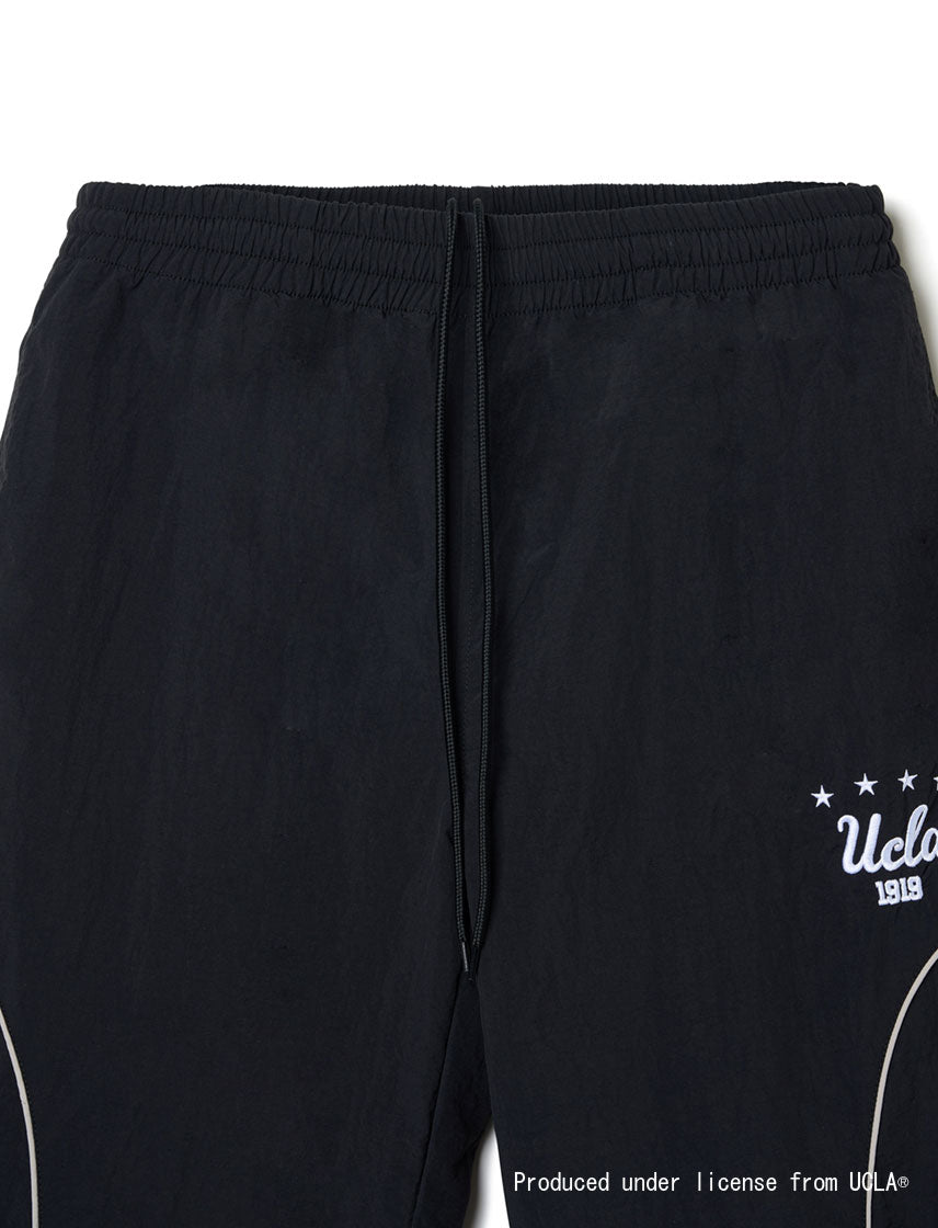 UCLA フットボール ナイロン切り替えトラックパンツ｜NUTMEG(ナツメグ