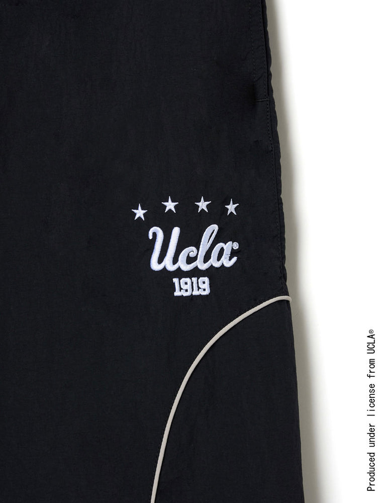 
                  
                    UCLA フットボール ナイロントラックパンツ
                  
                