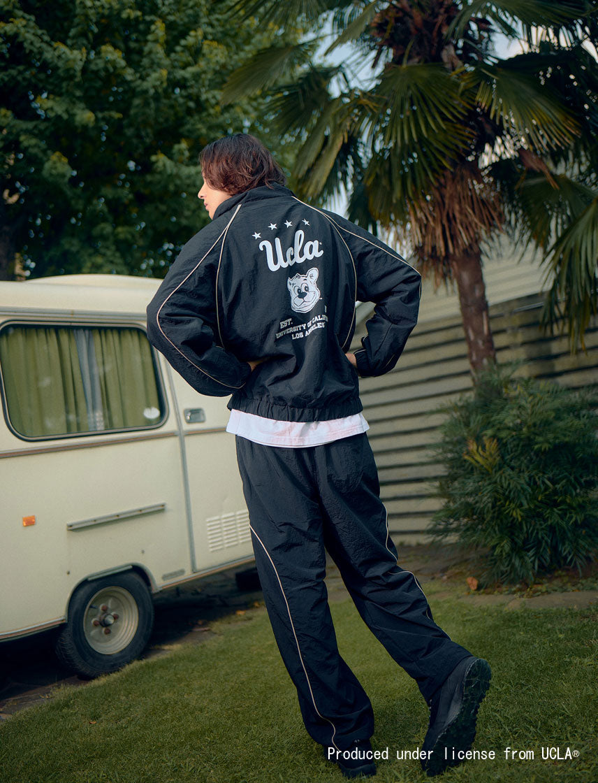 UCLA フットボール ナイロン切り替えトラックパンツ｜NUTMEG